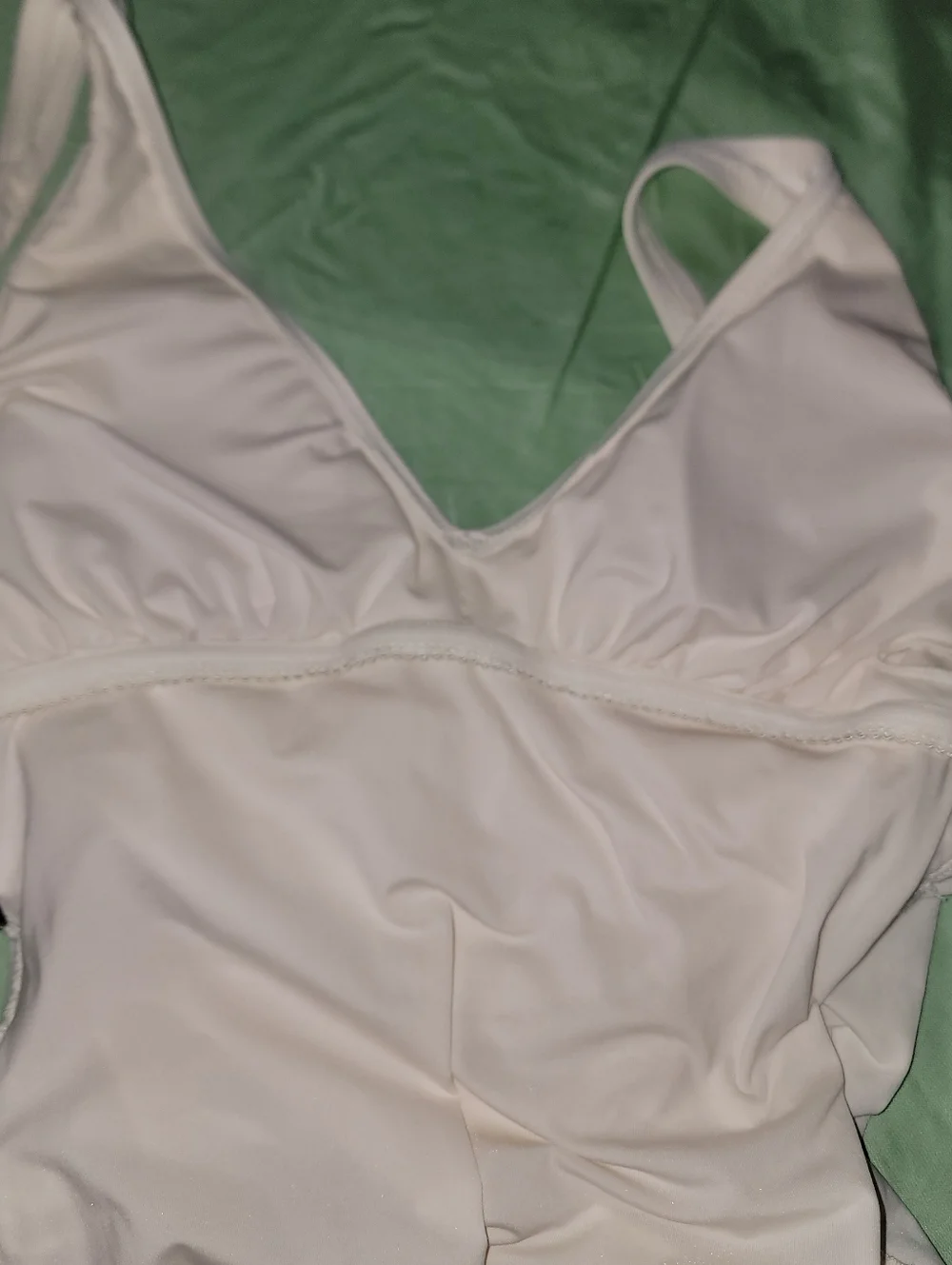 DKNYWomen's Crossover Tummy Control Ruched One-Piece Swimsuit - Picture 7 of 13